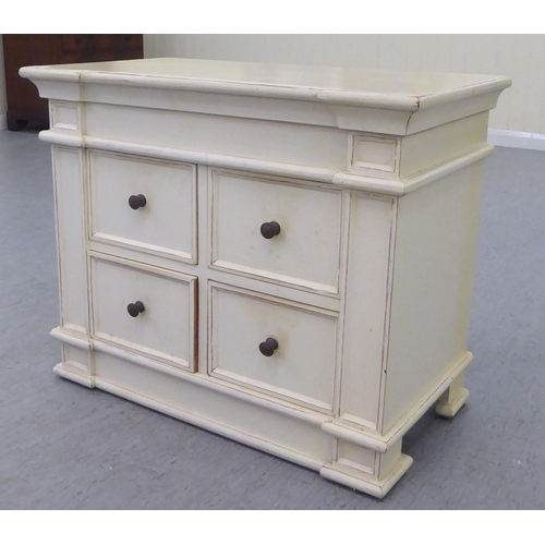 329 - A modern shabby chic painted inverted breakfront, four drawer cabinet, on a plinth  24