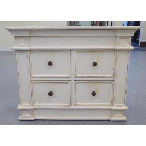 329 - A modern shabby chic painted inverted breakfront, four drawer cabinet, on a plinth  24