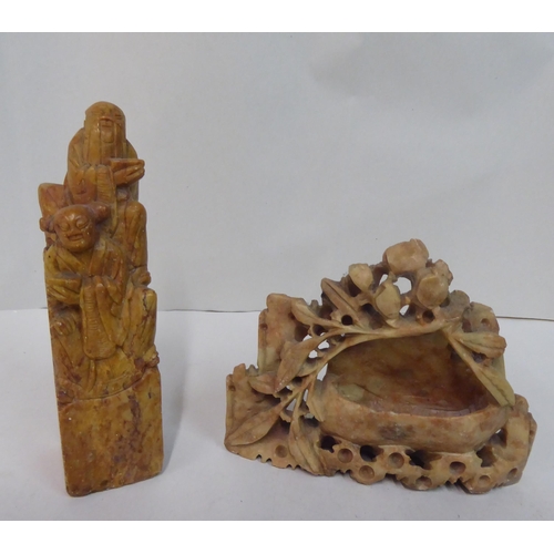 49 - 20thC carved Oriental soapstone ornaments: to include landscapes, birds and vases  mixed sizes