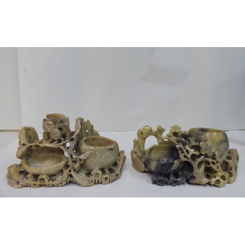 49 - 20thC carved Oriental soapstone ornaments: to include landscapes, birds and vases  mixed sizes