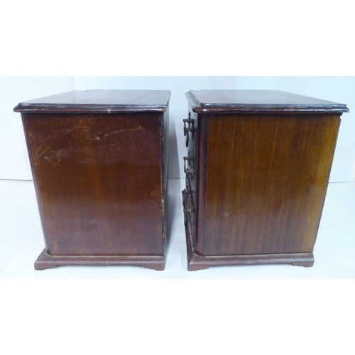 60 - A pair of late Victorian mahogany chests, each with three drawers, on a plinth  12