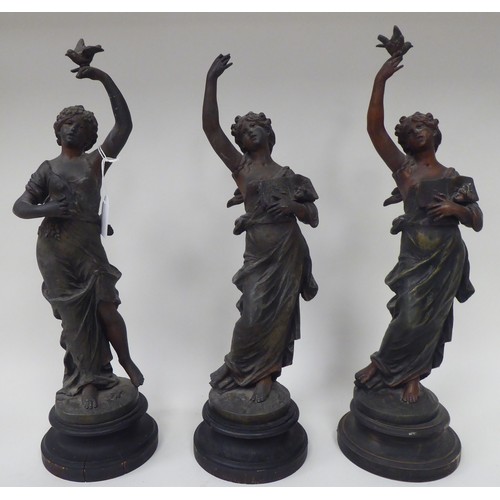 16 - Late 19thC French spelter models, each featuring a dancing maiden, on a turned plinth, viz. a pair a... 