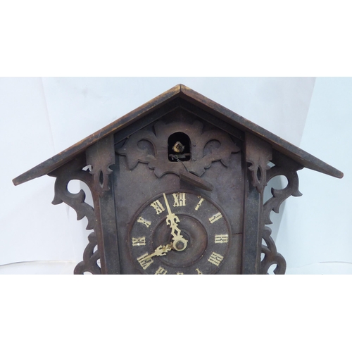 62 - A Black Forest carved wooden cased cuckoo clock  14