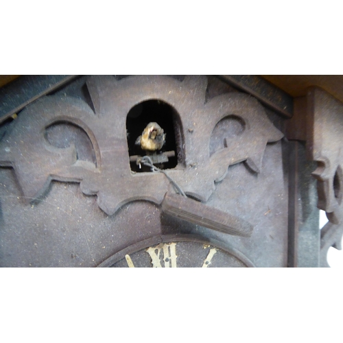 62 - A Black Forest carved wooden cased cuckoo clock  14