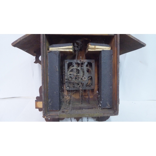 62 - A Black Forest carved wooden cased cuckoo clock  14