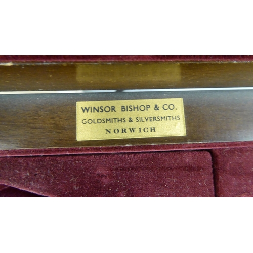 69 - A modern mahogany (empty) table canteen with a hinged serpentine front lid, over two fabric lined, f... 