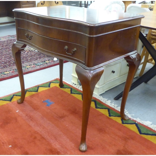 69 - A modern mahogany (empty) table canteen with a hinged serpentine front lid, over two fabric lined, f... 