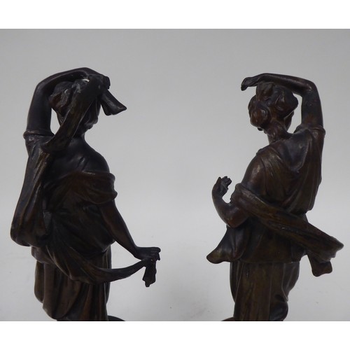 16 - Late 19thC French spelter models, each featuring a dancing maiden, on a turned plinth, viz. a pair a... 