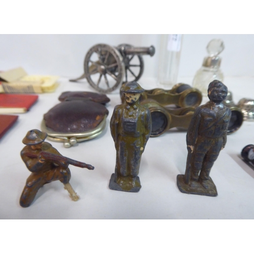 77 - A mixed lot: to include a pair of early 20thC French Petit brass opera glasses