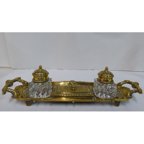 88 - Metalware: to include a late Victorian brass deskstand with two glass inkwells  8