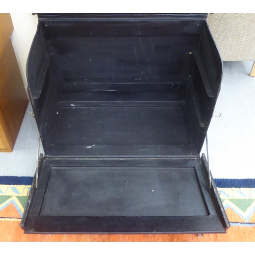 95 - A Vintage Brooks ebonised car trunk (unfitted) with straight sides and a hinged lid, on a plinth  23... 