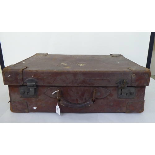 103 - An early 20thC gentleman's brown hide travelling case  stamped 'Tom Hill, Actual Maker, Sloane Squar... 