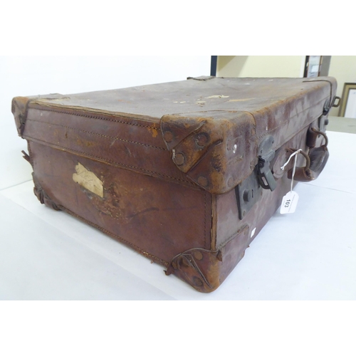 103 - An early 20thC gentleman's brown hide travelling case  stamped 'Tom Hill, Actual Maker, Sloane Squar... 