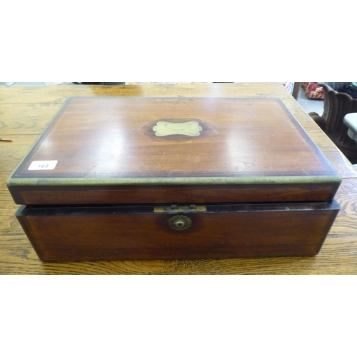 163 - Three late Victorian brass inlaid mahogany and walnut writing slopes  largest 7