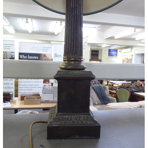 168 - Table lamps: to include a pair of gilt metal examples, fashioned as a Corinthian column  20