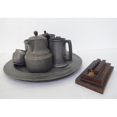 172 - Pewter collectables, viz. three tankards; a teapot; a milk jug; and a plate  15