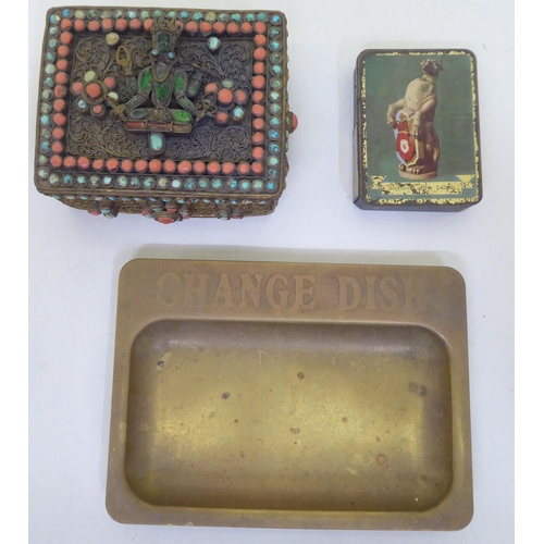 184 - A mixed lot: to include an Indian yellow metal box set with turquoise and coral beads  3.5