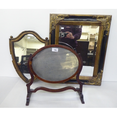 196 - Mirrors: to include a late Victorian shield shaped example, in a gilt frame  17