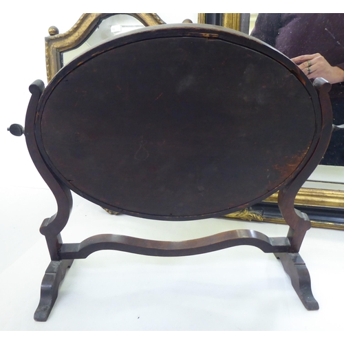 196 - Mirrors: to include a late Victorian shield shaped example, in a gilt frame  17