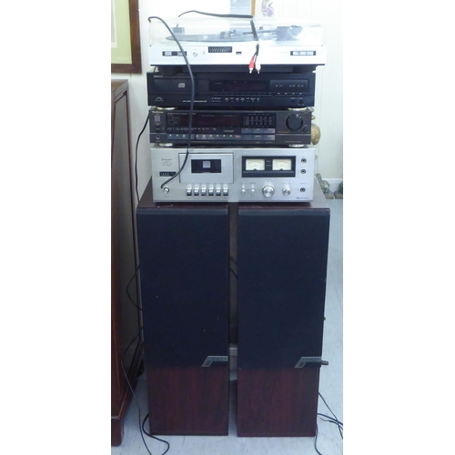 197 - A Denon stacking stereo system; and a pair of Mission rosewood effect floorstanding speakers  3... 