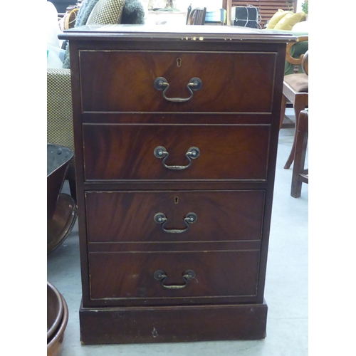 199 - A modern mahogany finished two drawer filing cabinet, the top set with a tooled green hide scriber, ... 