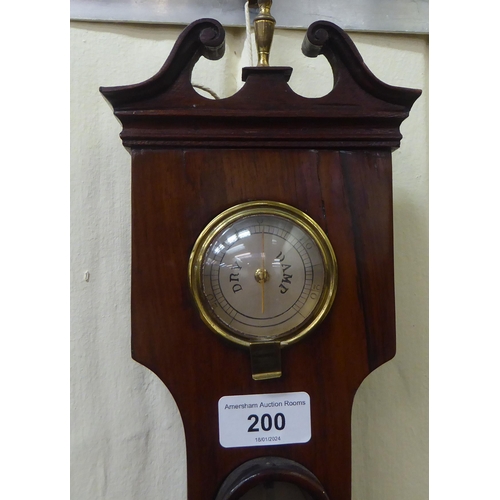 200 - An early 19thC rosewood cased wheel barometer with a thermometer, mirror and silvered dial  37