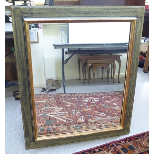 201 - A modern mirror, in a swept gilt frame  38