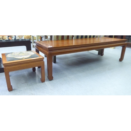 212 - Two mid 20thC Chinese fruitwood occasional tables, each raised on chamfered, square legs  largest 16... 