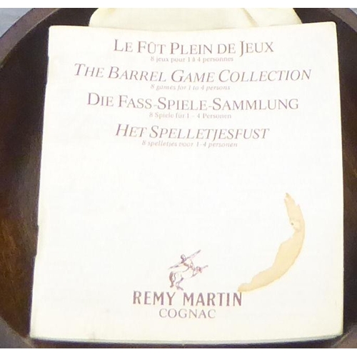 214 - A mixed lot: to include an oak spirit barrel  bearing a label 'Remy Martin'  12