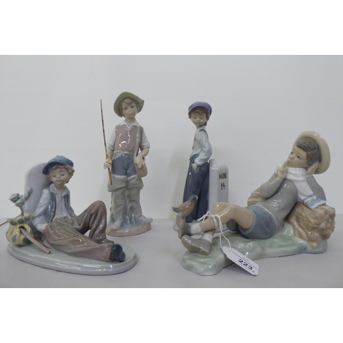 223 - Four Lladro figures: to include a young boy holding a fishing rod  9