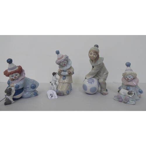 224 - Four Lladro figures, clowns, one playing an accordion for a puppy  6