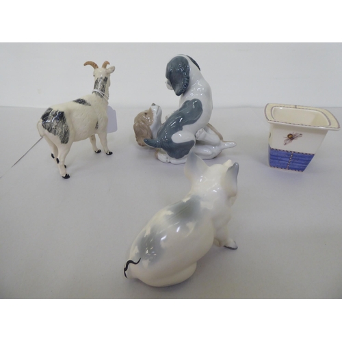 228 - Five Lladro figures: to include a boy dressed in winter clothing, walking a dog  8