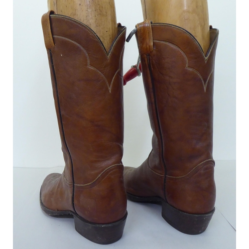 231 - A pair of Tony Lama brown leather cowboy boots  size 9