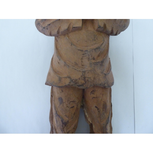 239 - A modern carved wooden figure, a native American  23.5