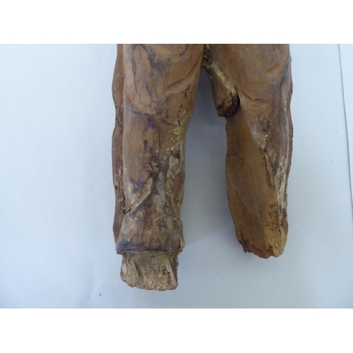 239 - A modern carved wooden figure, a native American  23.5