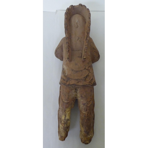 239 - A modern carved wooden figure, a native American  23.5