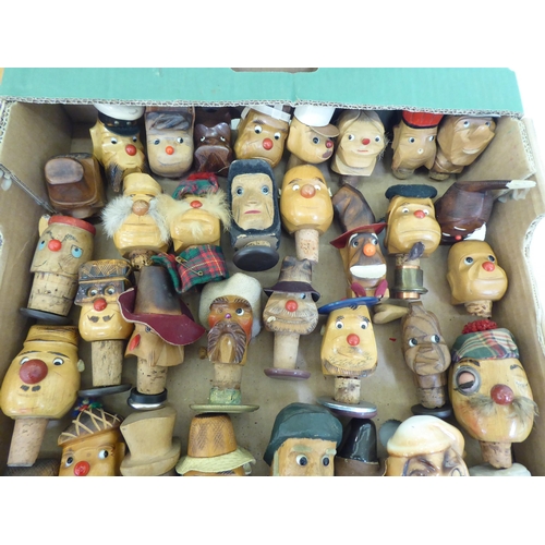 243 - Novelty wooden bottle stoppers, shaped as various characters: to include a chef  4.5