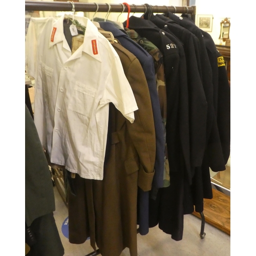 261 - Military and service uniforms: to include an army overcoat(Please Note: this lot is subject to the s... 