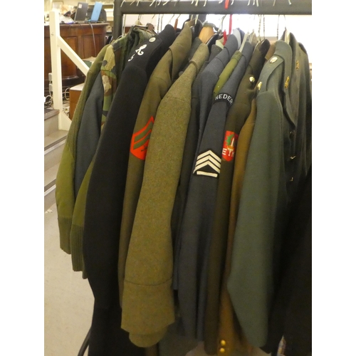 262 - Military and service uniforms: to include a German overcoat(Please Note: this lot is subject to the ... 