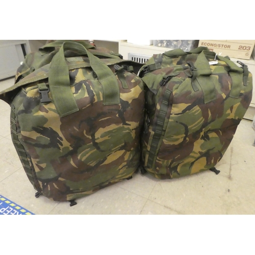 266 - Two American Army rucksacks, containing military accessories(Please Note: this lot is subject to the... 