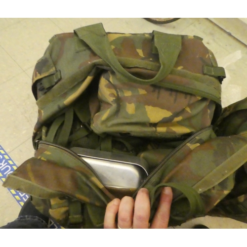 266 - Two American Army rucksacks, containing military accessories(Please Note: this lot is subject to the... 