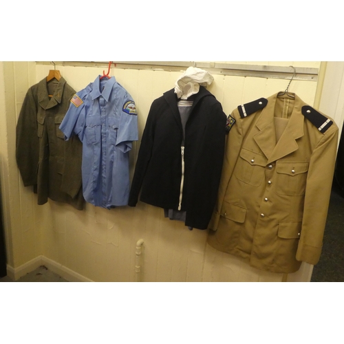 267 - Military and service uniforms: to include a Military Police jacket(Please Note: this lot is subject ... 