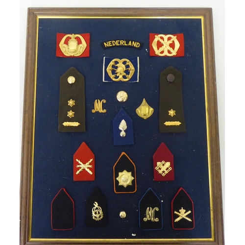 268 - Military badges and buttons, mostly mounted on boards(Please Note: this lot is subject to the statem... 