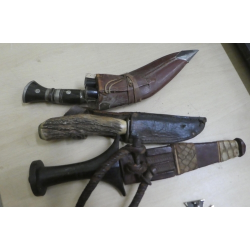 269 - A mixed lot: to include a kukri on a bone handle, the blade 7