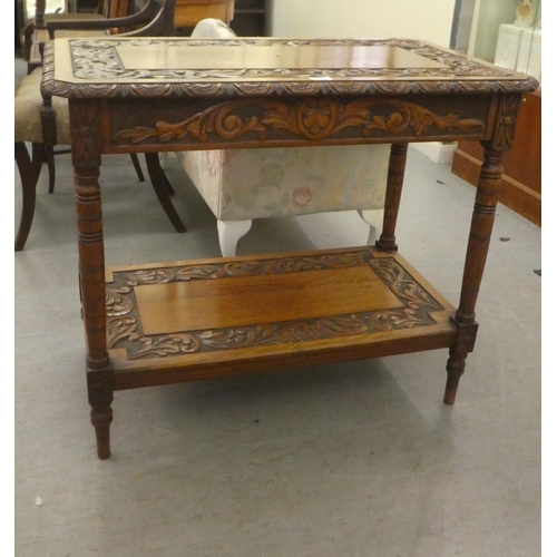 278 - A late Victorian ornately carved oak hall table, raised on turned, tapered legs  30