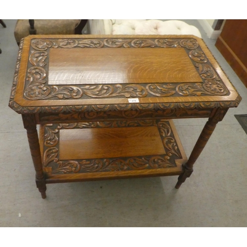 278 - A late Victorian ornately carved oak hall table, raised on turned, tapered legs  30