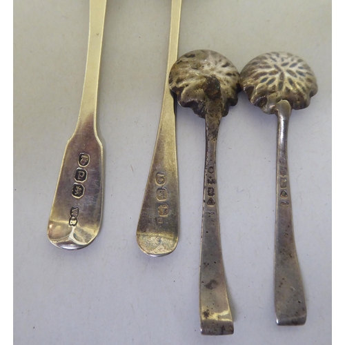 292 - Silver items: to include a set of three salt cellars, a serving spoon and four various napkin rings&... 