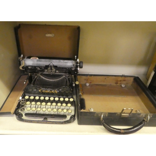 293 - A 1917 Corona portable manual typewriter with a folding carriage, in a fitted carrying case