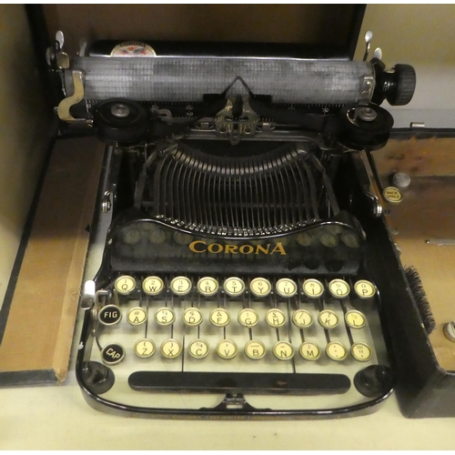 293 - A 1917 Corona portable manual typewriter with a folding carriage, in a fitted carrying case