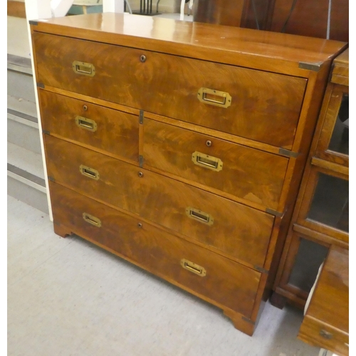 295 - A late 19thC and later mahogany two part military chest with brass corner re-enforcement and recesse... 